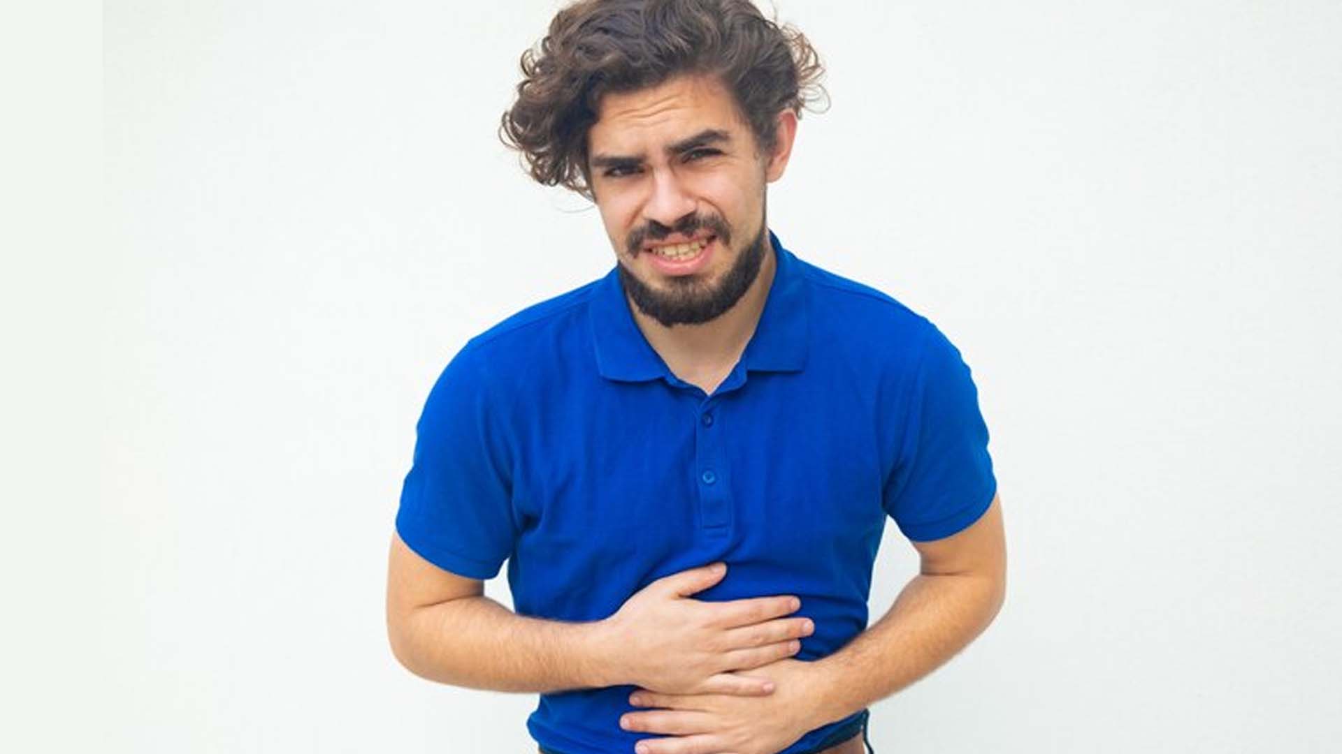 Man Suffering from Severe Stomach Pain